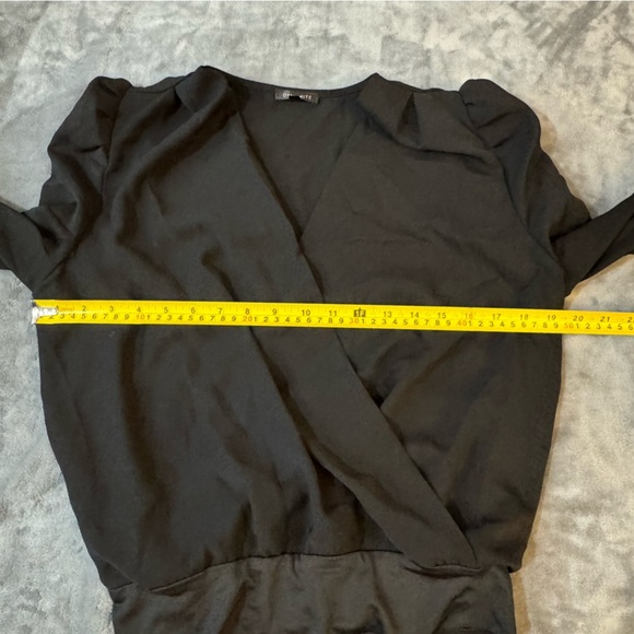 Dynamite Stylish Black Bodysuit

#1254 - Picture 3 of 8